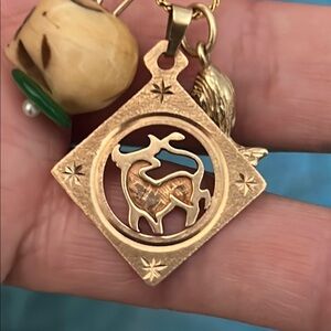 Elegant 10K Gold Taurus Zodiac Pendant